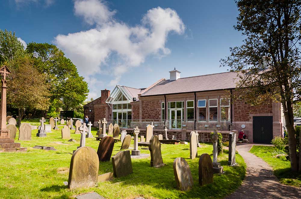 view of St Bridget's centre across cemetary